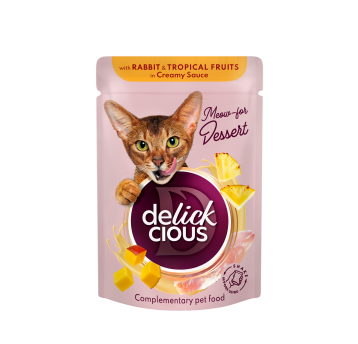 Delickcious Uzupełniająca karma dla kotów - Płatki z królikiem i owocami tropikalnymi w sosie 85g/12